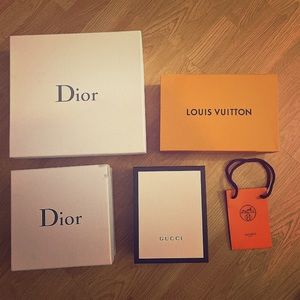 Louis Vuitton, Dior, Gucci boxes one Hermes bag